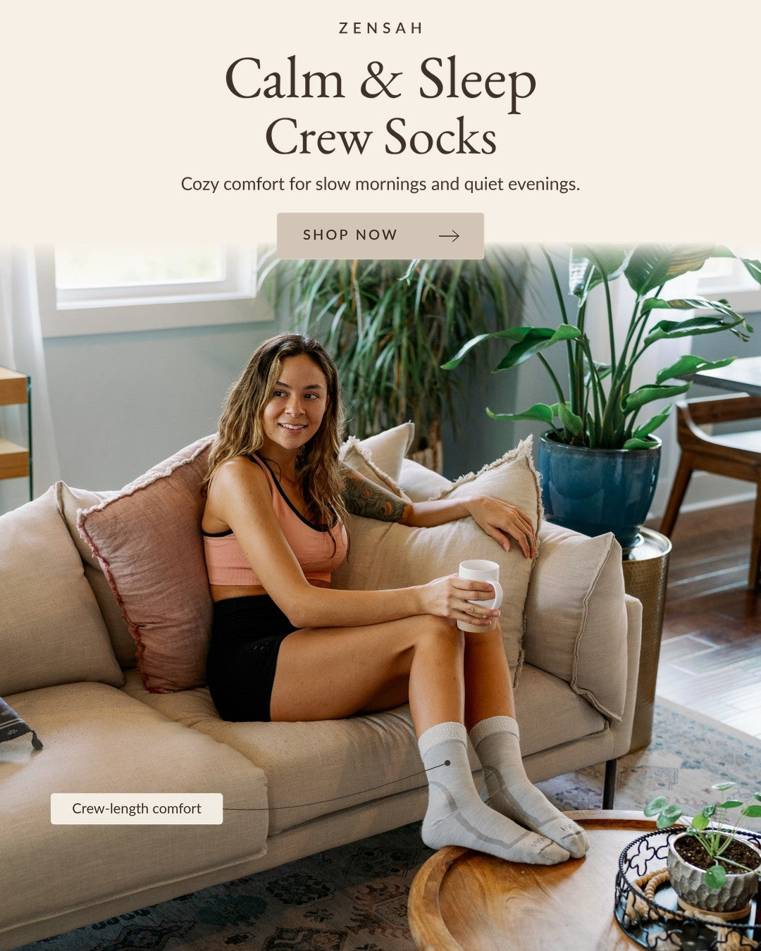 Calm & Sleep Crew Socks - woman relaxing on a couch in Zensah sleep socks